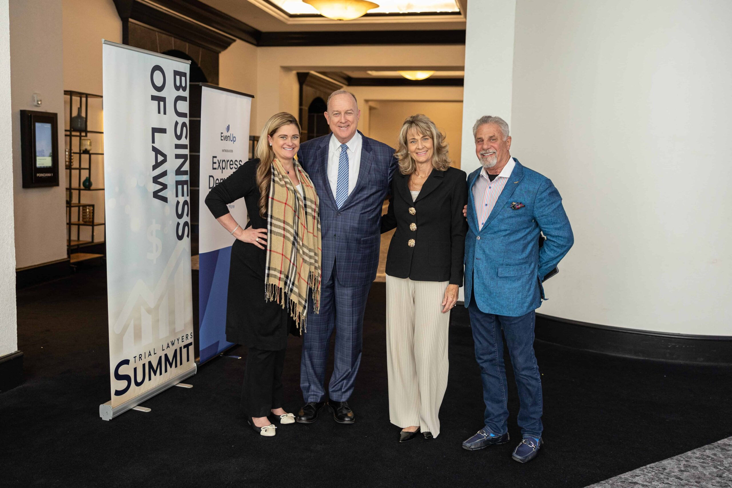 An image of members of the national triallawyers smiling at an event
